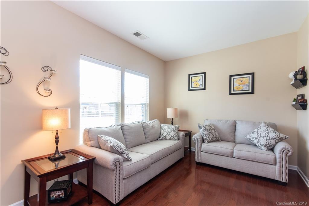 10937 Tailwater Street Davidson, NC 28036 - Photo 3 of 34 a living room with furniture and a large window