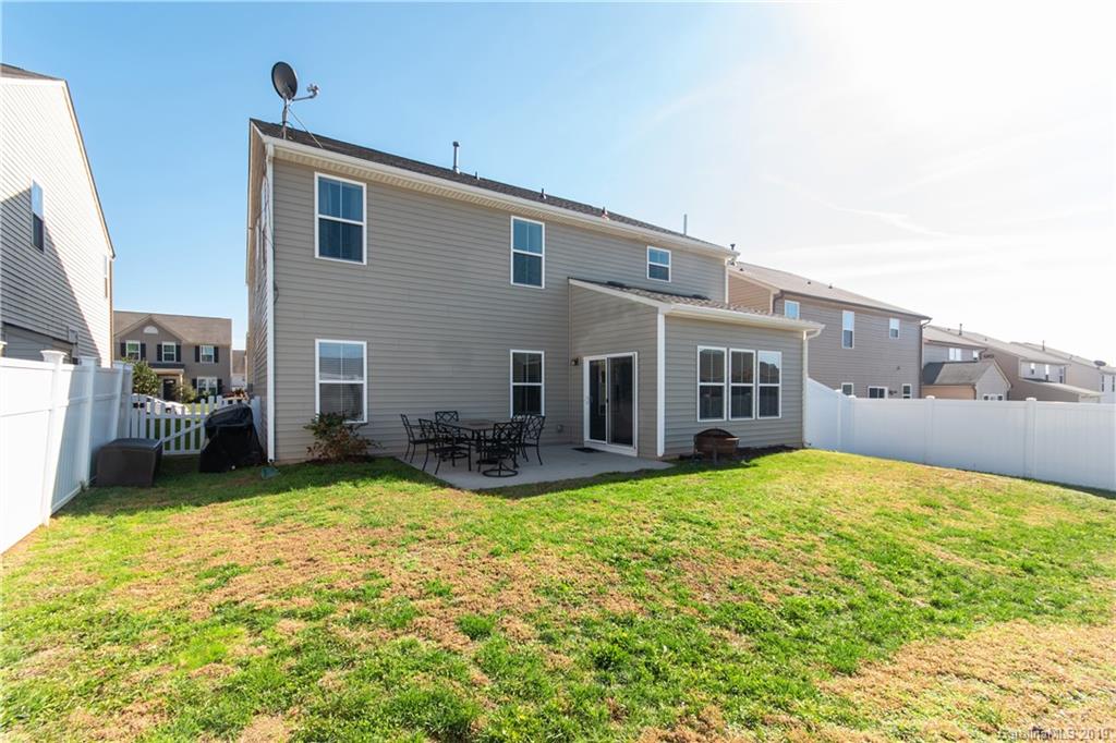 10937 Tailwater Street Davidson, NC 28036 - Photo 24 of 34 a view of a house with swimming pool and a yard