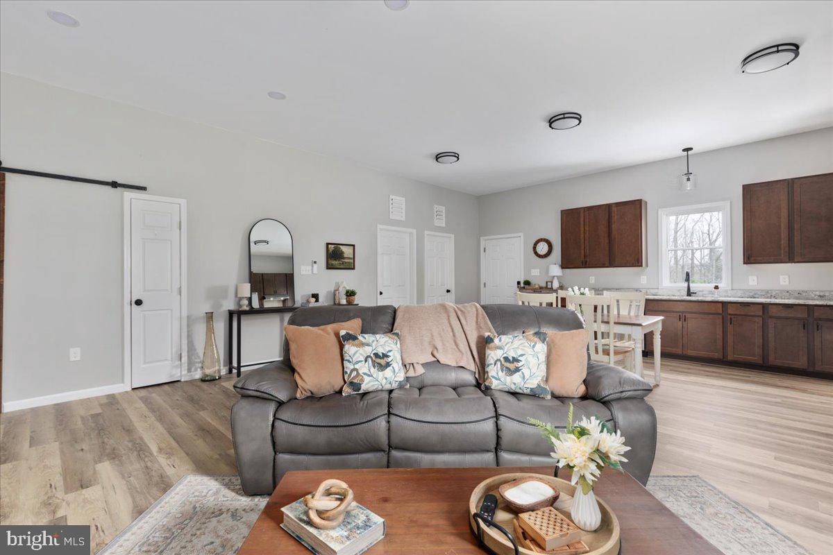 5331 Merry Oaks Road The Plains, VA 20198 - Photo 13 of 54 a living room with furniture and a flat screen tv