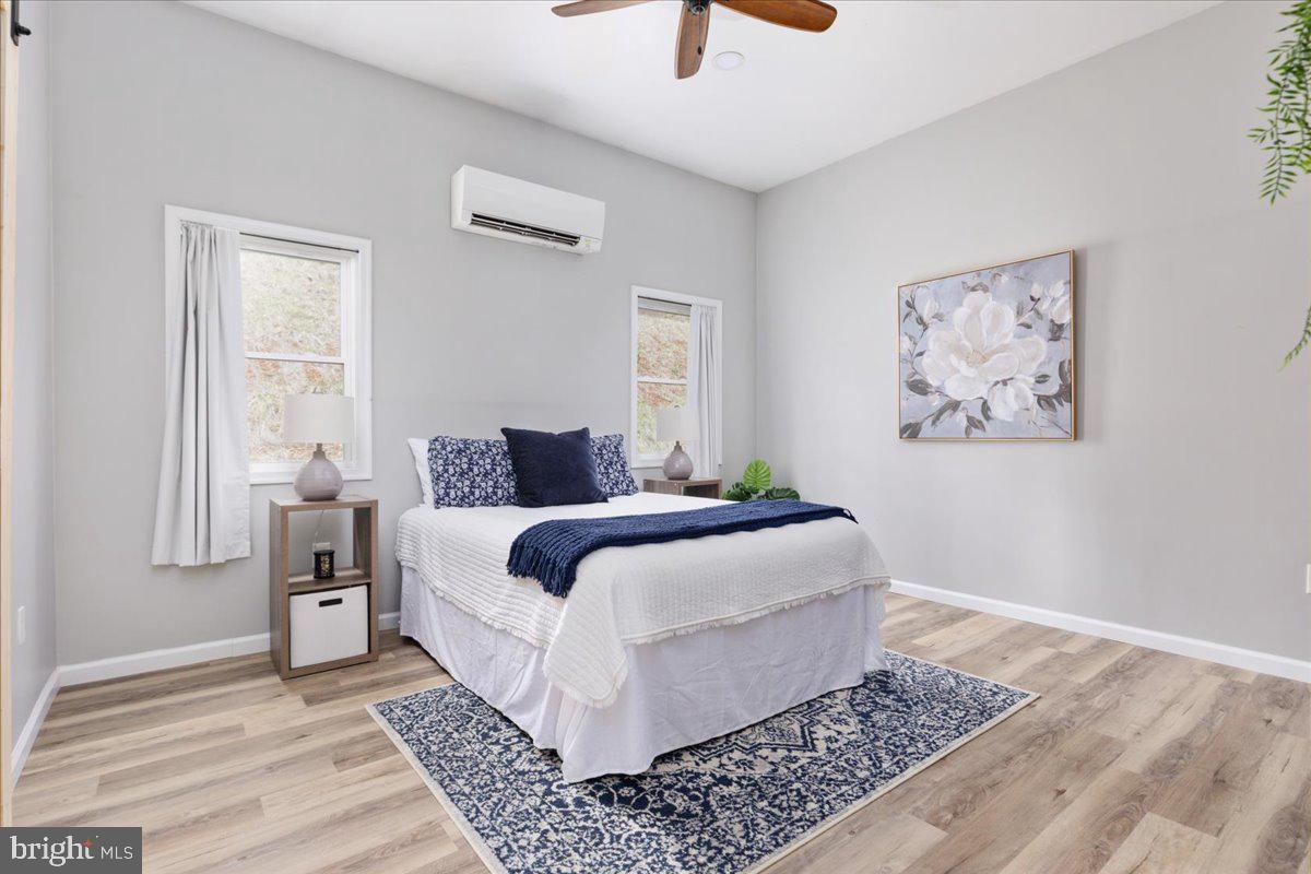 5331 Merry Oaks Road The Plains, VA 20198 - Photo 16 of 54 a bedroom with a large bed and a window