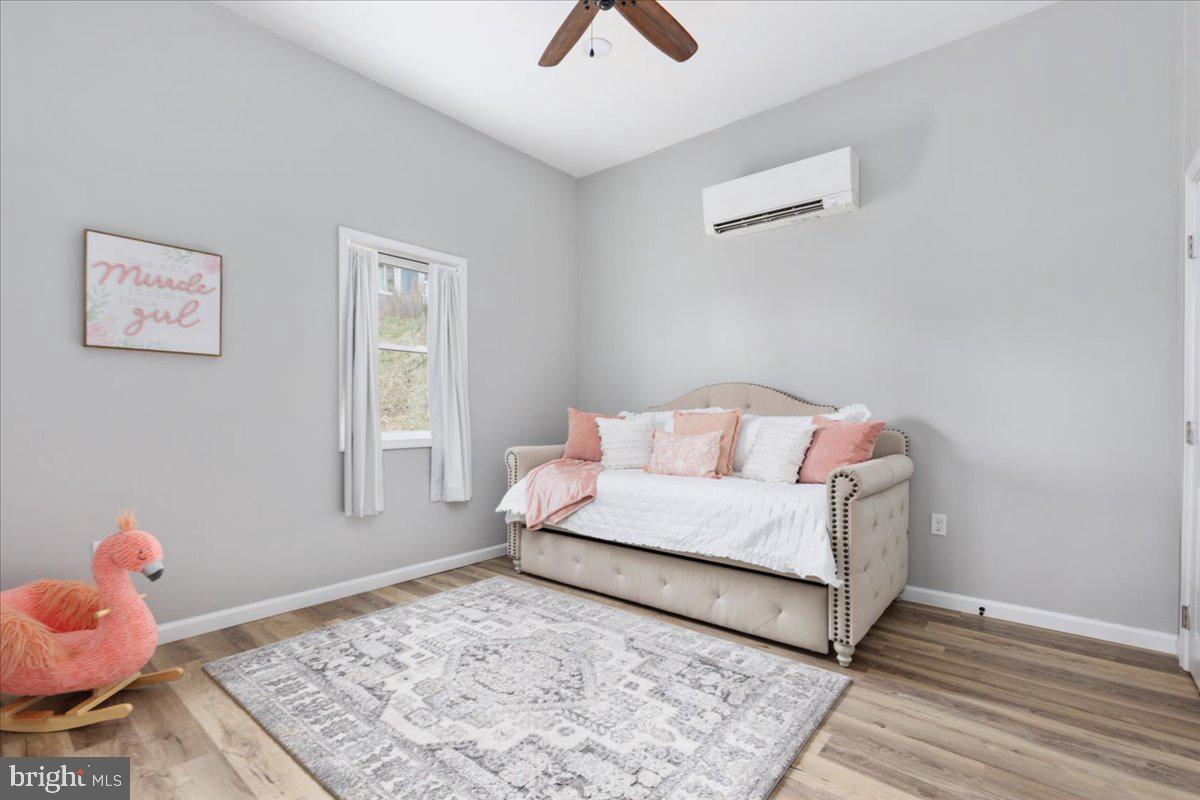 5331 Merry Oaks Road The Plains, VA 20198 - Photo 18 of 54 a living room with furniture and a window