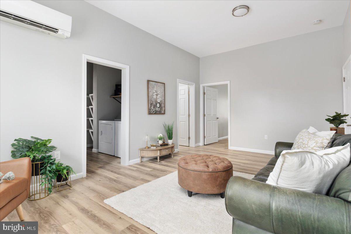 5331 Merry Oaks Road The Plains, VA 20198 - Photo 23 of 54 a living room with furniture and a potted plant