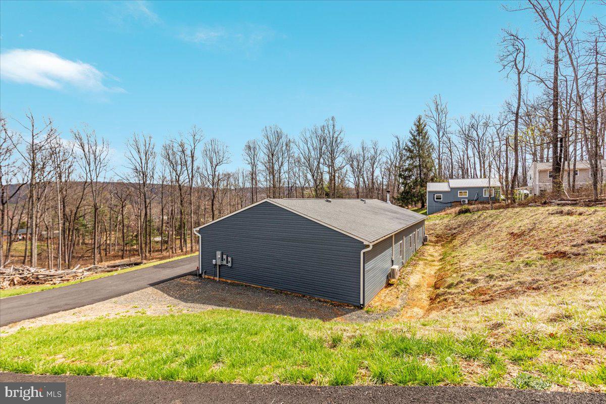 5331 Merry Oaks Road The Plains, VA 20198 - Photo 41 of 54 a backyard of a house with lots of green space