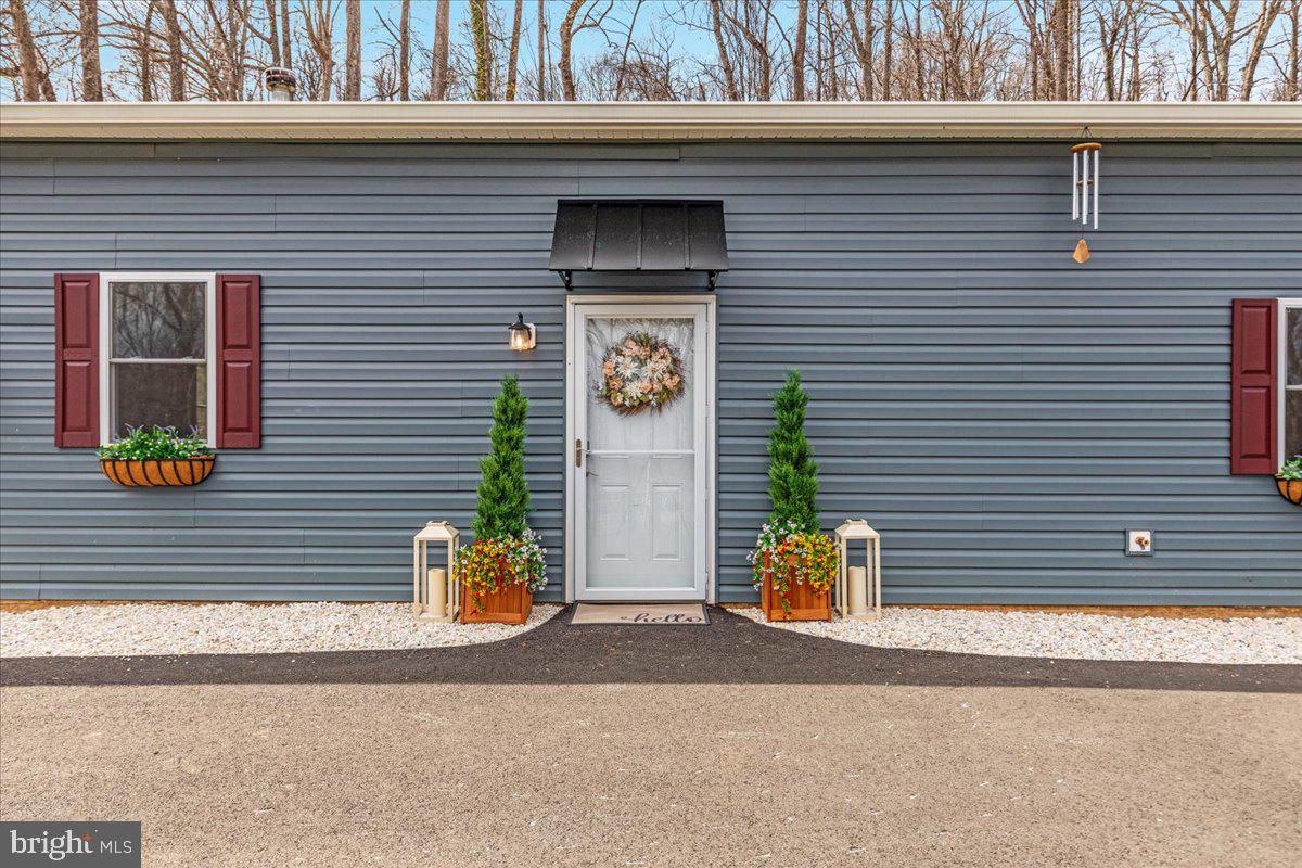 5331 Merry Oaks Road The Plains, VA 20198 - Photo 7 of 54 a front view of a house with street