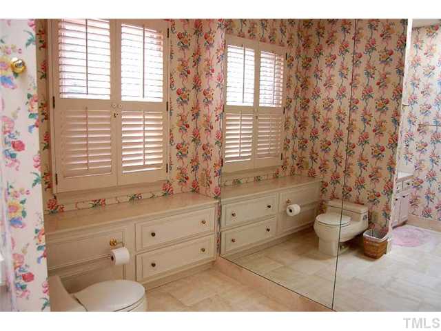 815 Marlowe Road, Unit 1 Raleigh, NC 27609 - Photo 12 of 22 a bathroom with a sink and a mirror
