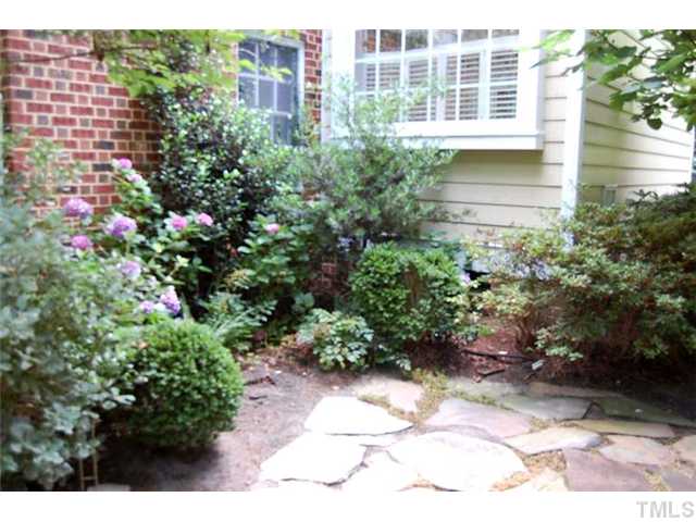815 Marlowe Road, Unit 1 Raleigh, NC 27609 - Photo 18 of 22 a view of a house with potted plants