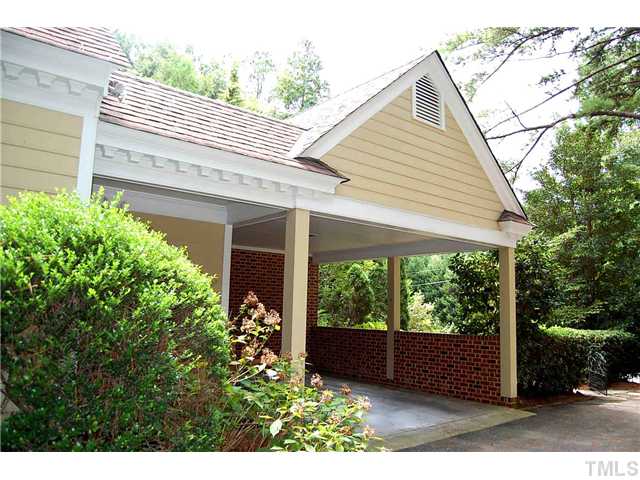 815 Marlowe Road, Unit 1 Raleigh, NC 27609 - Photo 20 of 22 a view of a house with a yard and plants