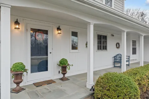 a view of a entryway door front of house