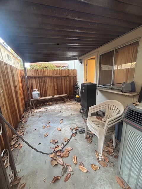 10881 Coloma Road, Unit 1 Rancho Cordova, CA 95670 - Photo 6 of 13 a view of a backyard with furniture and iron fence