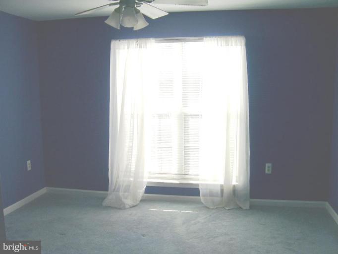 21014 Timber Ridge Terrace, Unit 203 Ashburn, VA 20147 - Photo 11 of 14 Bedroom #1