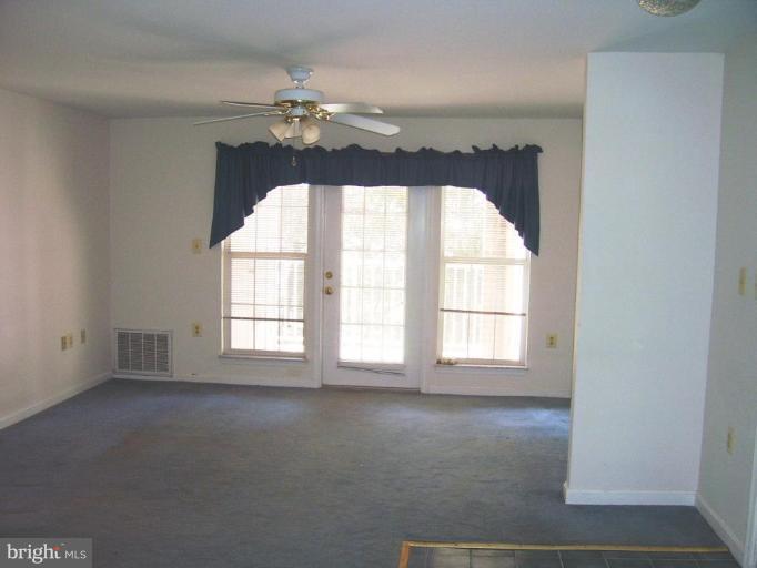 21014 Timber Ridge Terrace, Unit 203 Ashburn, VA 20147 - Photo 4 of 14 Living Room