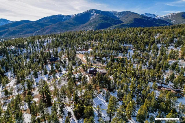 a view of a and mountain in a field