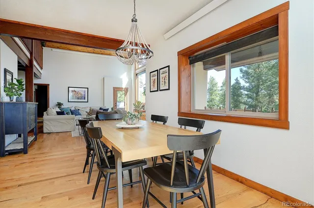 a kitchen with granite countertop a sink cabinets and window