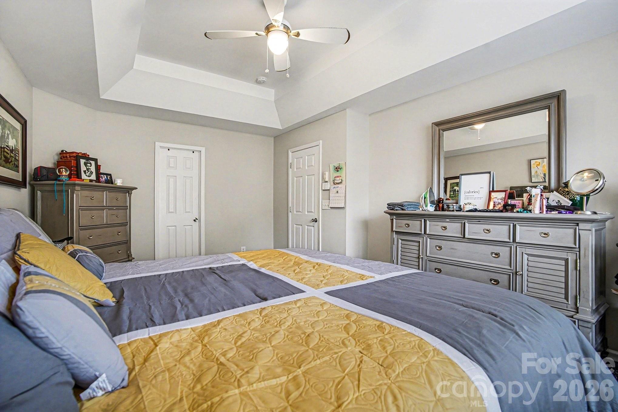 5625 Davis Ridge Drive Charlotte, NC 28269 - Photo 20 of 27 a bedroom with a bed and wooden floor