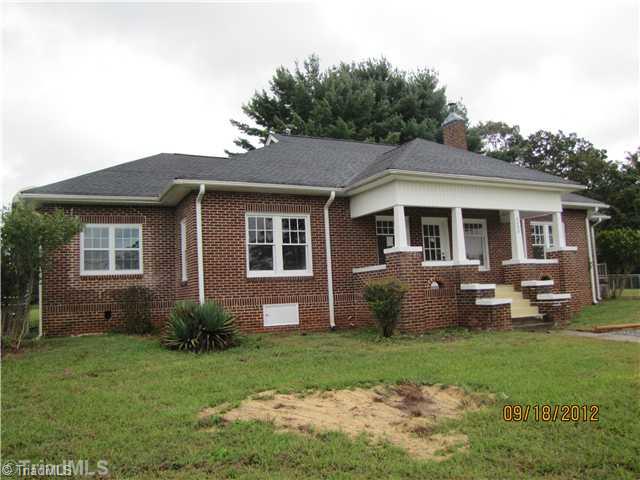 3635 Smithtown Road East Bend, NC 27018 - Photo 11 of 13 Exterior Front. 2300 Square Feet all on one level! All brick except for Den. Tons of property. Very quiet & relaxing.
