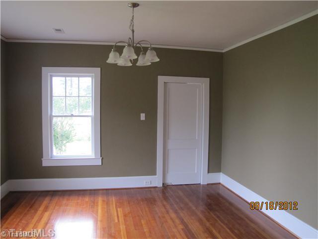 3635 Smithtown Road East Bend, NC 27018 - Photo 3 of 13 Dining Room. Formal DR w/swinging door to Kitchen. Hardwoods continue. Elegant formal room to entertain in. Fresh interior paint colors throughout home.