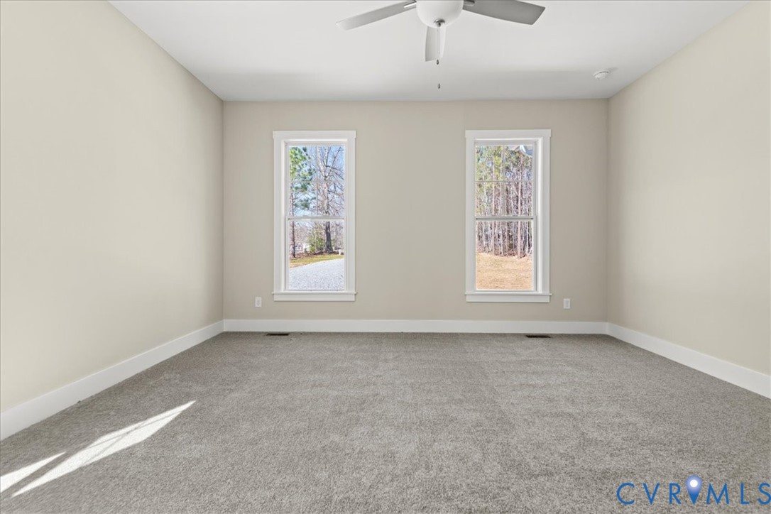 1191 Lewiston Plank Road Burkeville, VA 23922 - Photo 16 of 29 an empty room with windows and closet