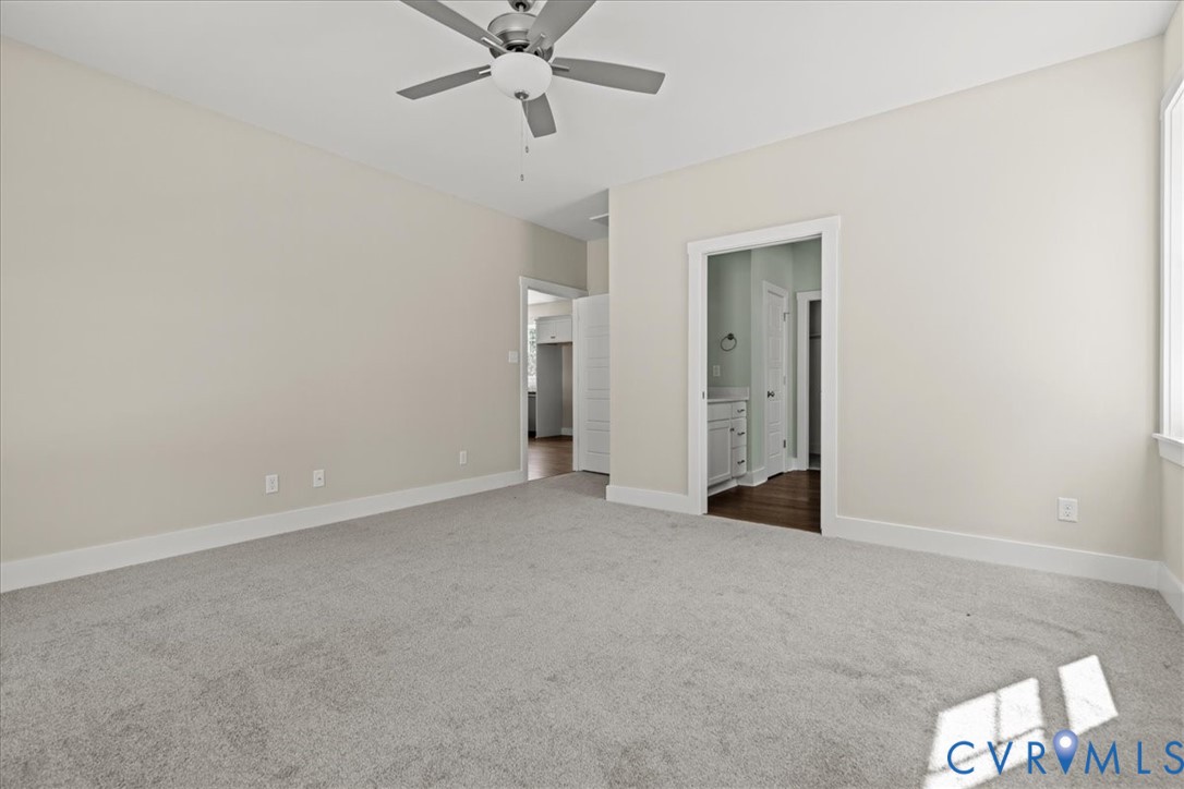 1191 Lewiston Plank Road Burkeville, VA 23922 - Photo 17 of 29 an empty room with a ceiling fan and a window