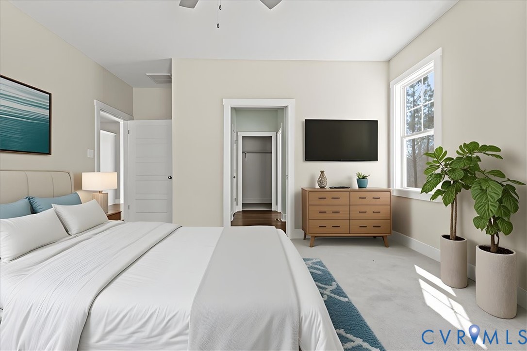 1191 Lewiston Plank Road Burkeville, VA 23922 - Photo 18 of 29 a bedroom with a bed and a flat screen tv
