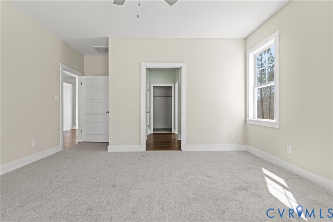 1191 Lewiston Plank Road Burkeville, VA 23922 - Photo 19 of 29 an empty room with windows and closet