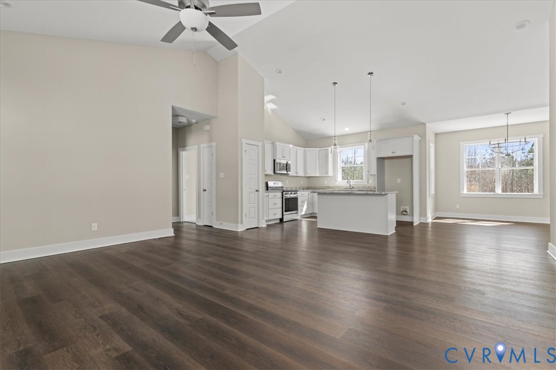 1191 Lewiston Plank Road Burkeville, VA 23922 - Photo 24 of 29 a view of an empty room with a window and wooden floor