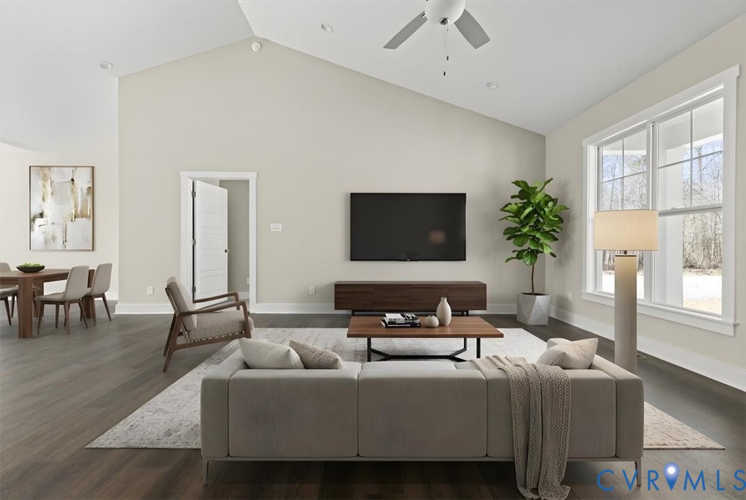 1191 Lewiston Plank Road Burkeville, VA 23922 - Photo 4 of 29 a living room with furniture wooden floor and a flat screen tv