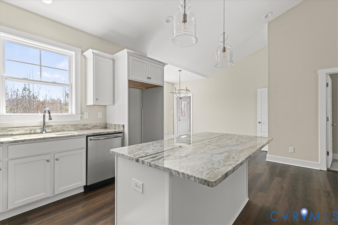 1191 Lewiston Plank Road Burkeville, VA 23922 - Photo 7 of 29 a kitchen with granite countertop a sink stove and refrigerator