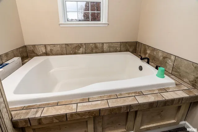a bathroom with a bathtub