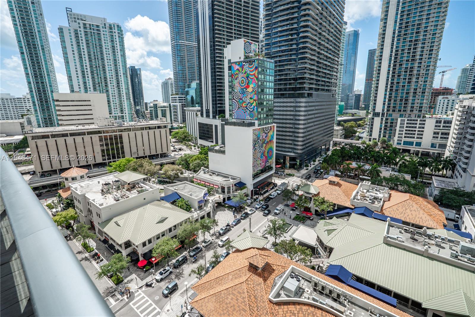 45 Southwest 9th Street, Unit 1205 Miami, FL 33130 - Photo 26 of 27 a view of a patio with couches table and chairs and potted plants