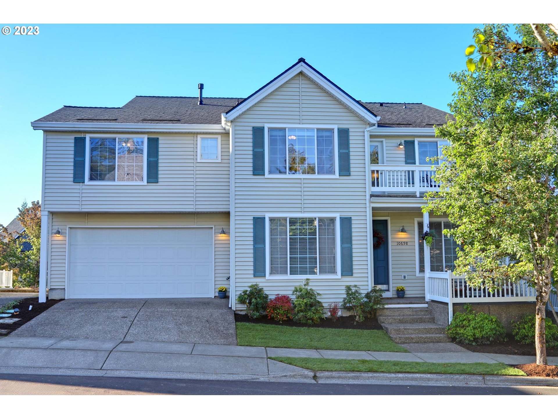 10698 Southwest Washington Street Portland, OR 97225 - Photo 1 of 25 a front view of a house with garden