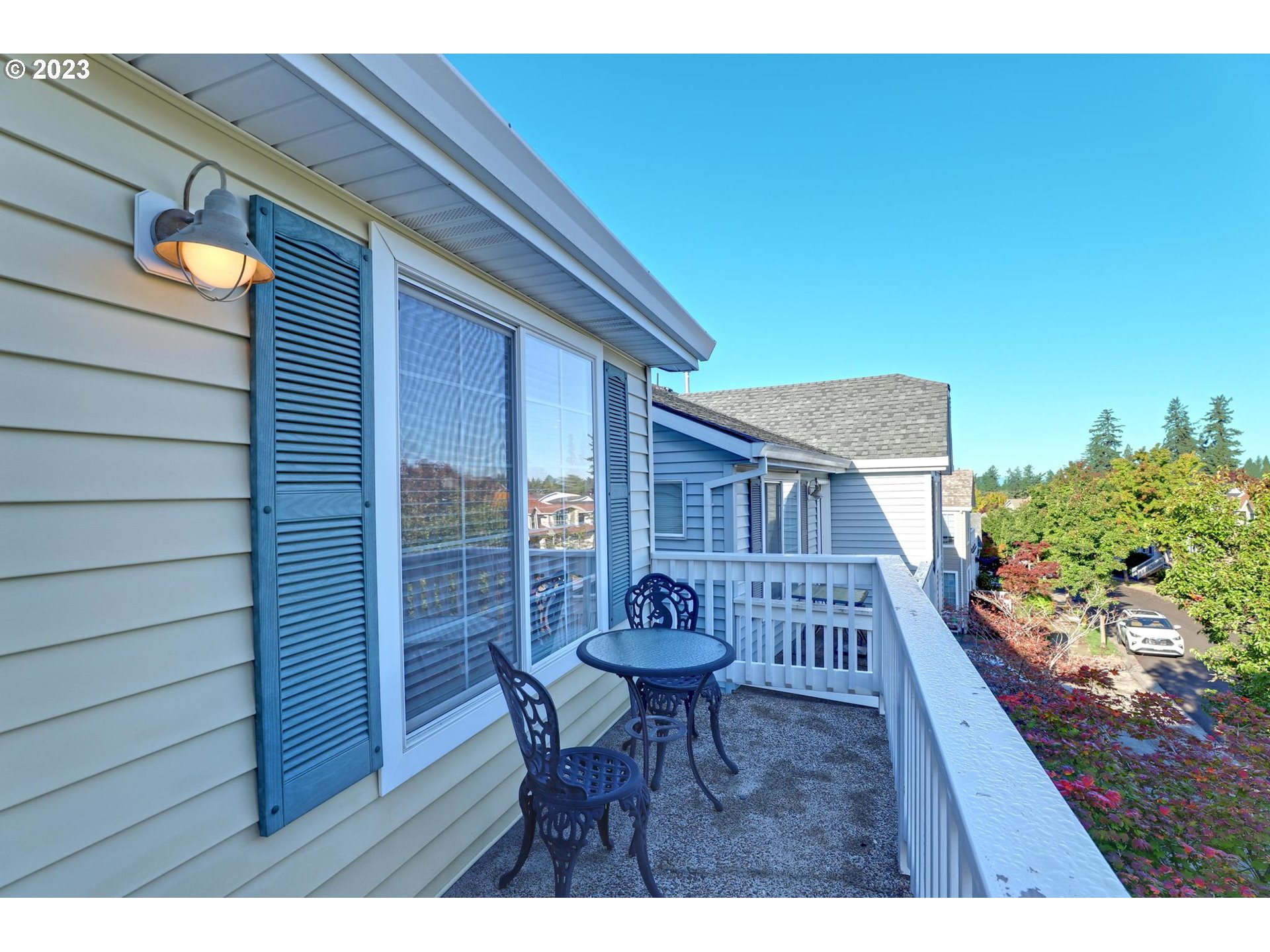 10698 Southwest Washington Street Portland, OR 97225 - Photo 24 of 25 a view of a deck with a table and chairs
