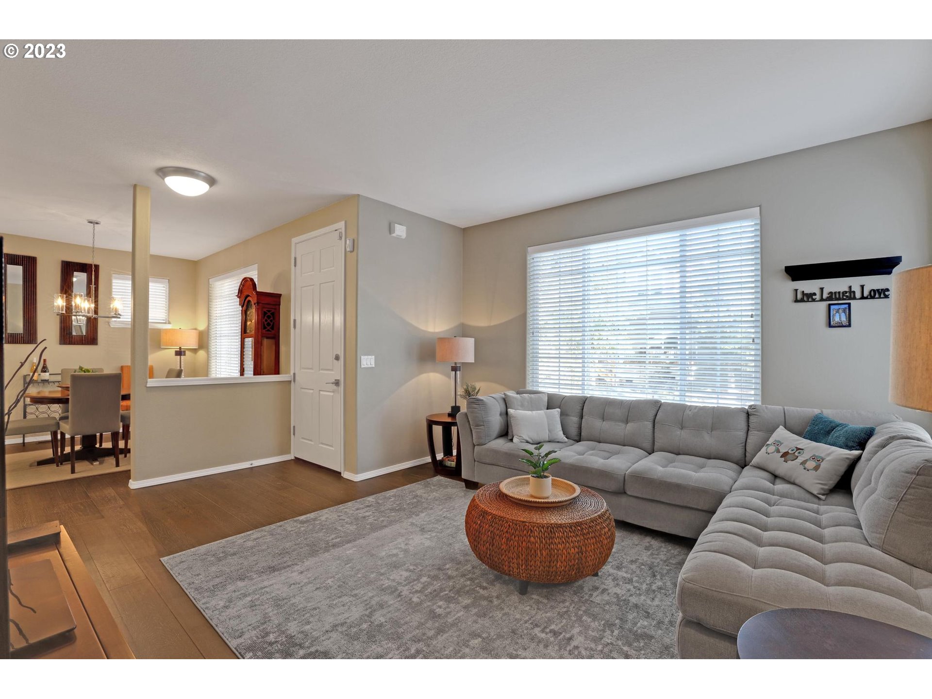 10698 Southwest Washington Street Portland, OR 97225 - Photo 4 of 25 a living room with furniture and a window