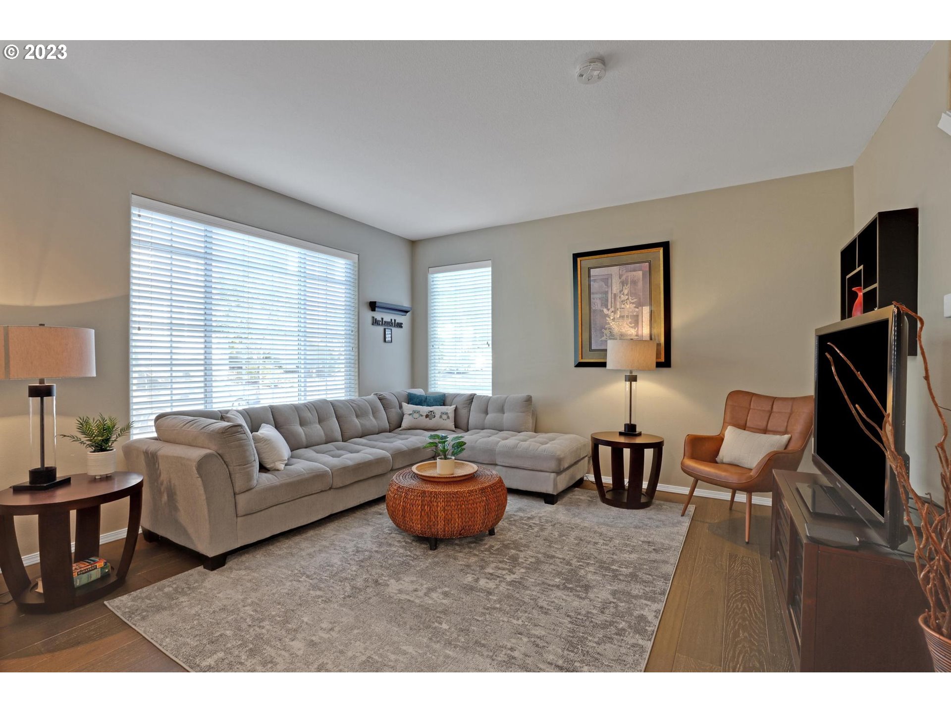 10698 Southwest Washington Street Portland, OR 97225 - Photo 5 of 25 a living room with furniture a rug and a window