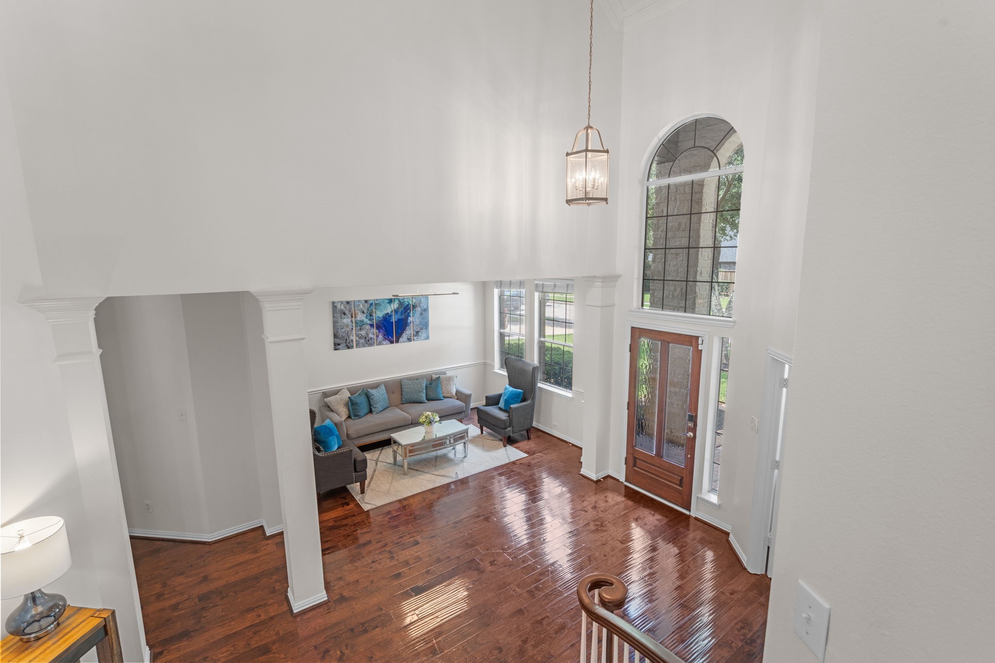 14718 Ramblebrook Humble, TX 77396 - Photo 4 of 38 A view toward the front entry highlights the home’s open sense of arrival, with the private office and flexible sitting or dining space thoughtfully positioned near the entrance.