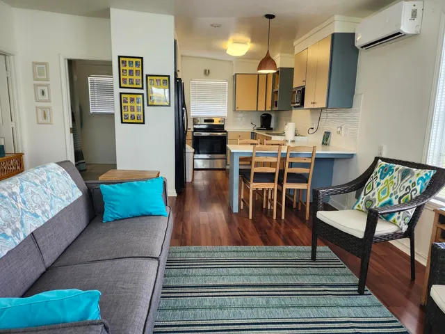 a living room with furniture and a table