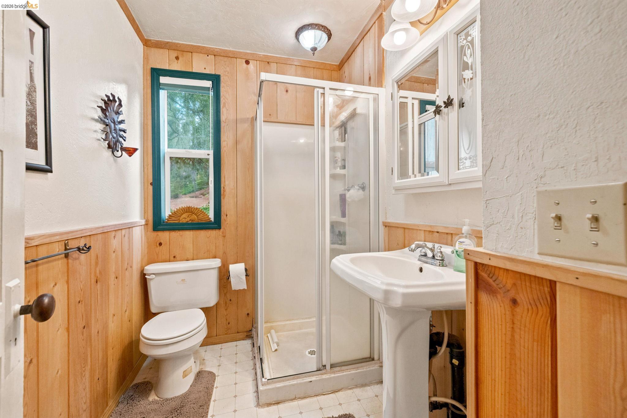 25822 Long Barn Sugar Pine Road Long Barn, CA 95335 - Photo 17 of 28 a bathroom with a sink toilet and shower