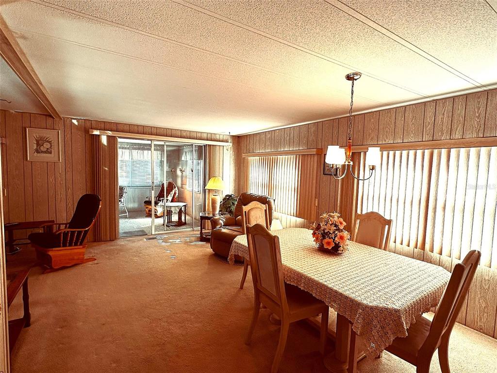 1100 South Belcher Road, Unit 508 Largo, FL 33771 - Photo 19 of 37 a view of a a dining room with furniture window and outside view