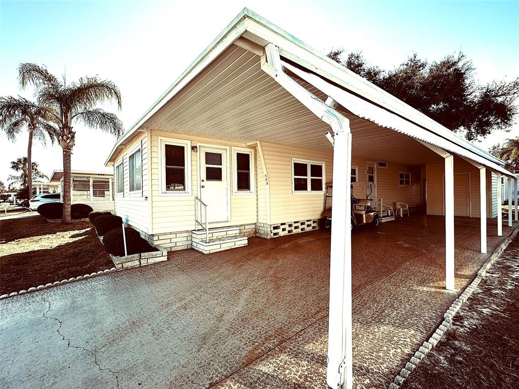1100 South Belcher Road, Unit 508 Largo, FL 33771 - Photo 2 of 37 a view of a house with a patio