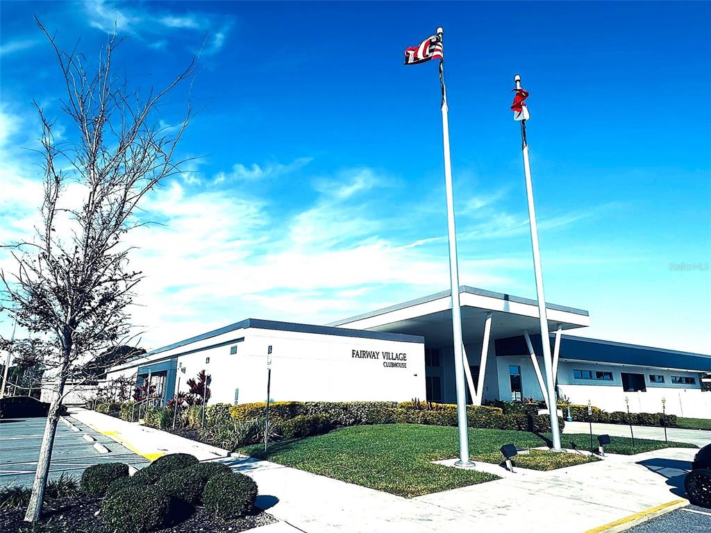 1100 South Belcher Road, Unit 508 Largo, FL 33771 - Photo 27 of 37 a view of a house with a yard