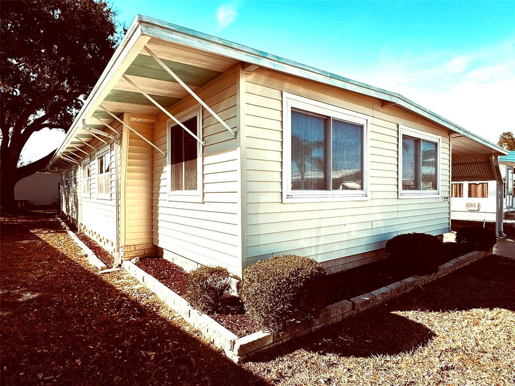 1100 South Belcher Road, Unit 508 Largo, FL 33771 - Photo 37 of 37 a view of a house with a yard