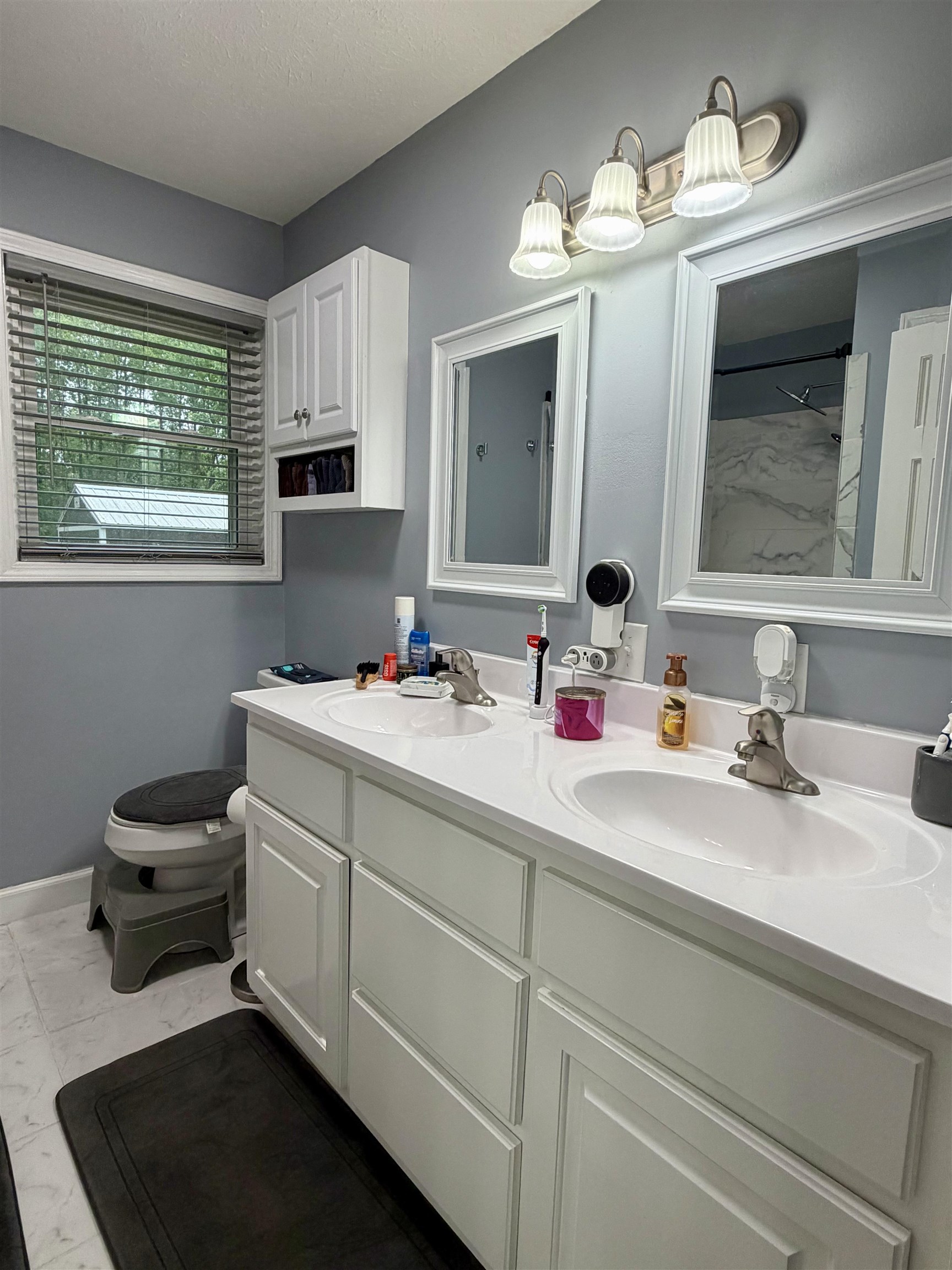 8022 45th Highway Ramer, TN 38367 - Photo 11 of 20 a bathroom with a sink vanity and a mirror