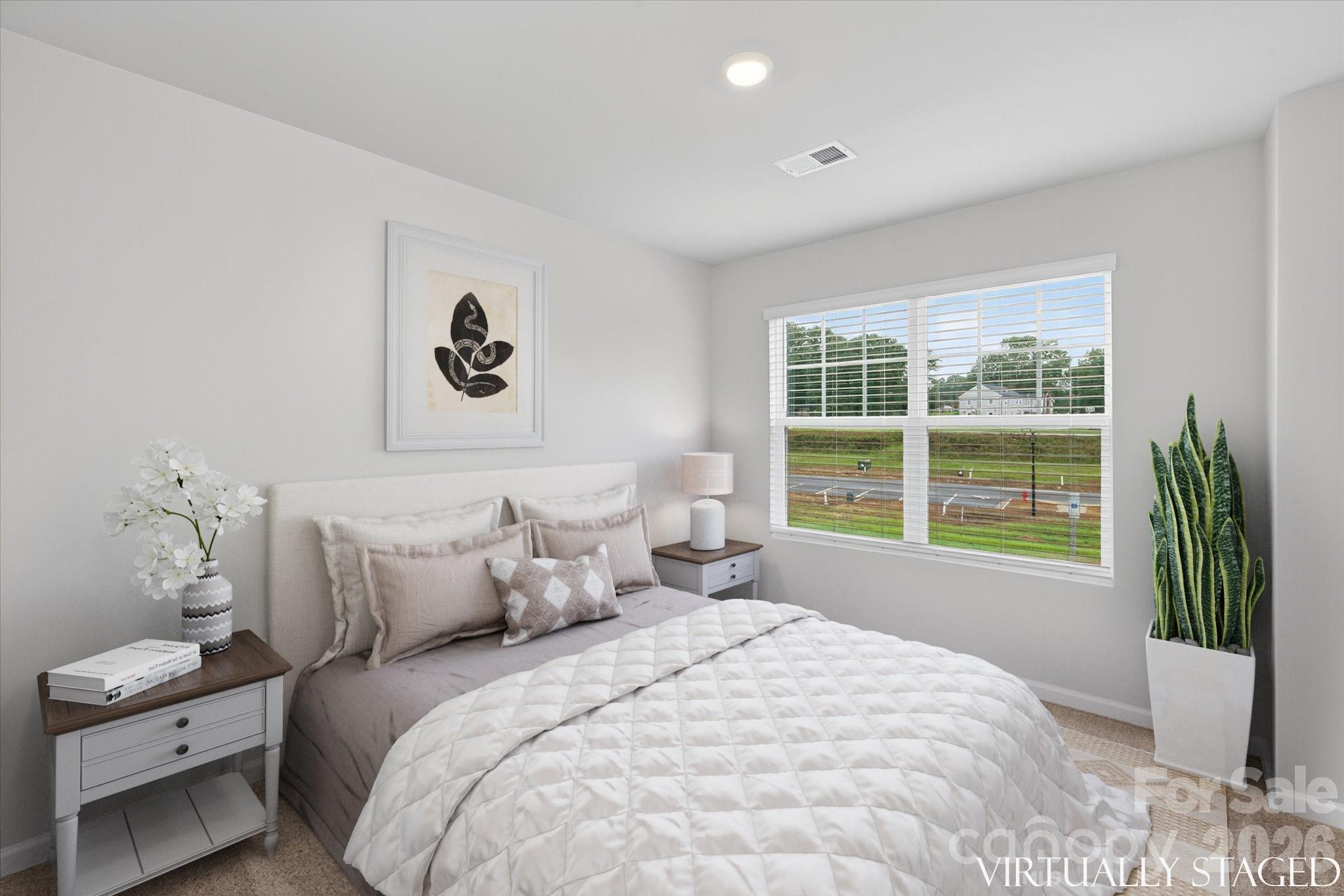 1850 Rhyne Elementary Drive Gastonia, NC 28052 - Photo 9 of 20 a bedroom with a bed and a window