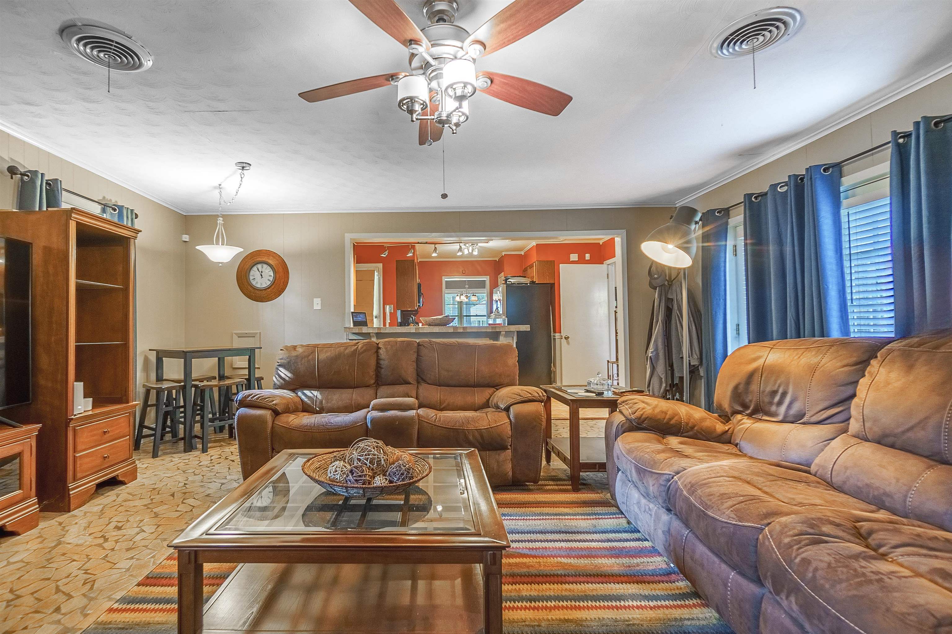 1544 Whitewater Road Memphis, TN 38117 - Photo 10 of 18 a living room with furniture ceiling fan and a rug