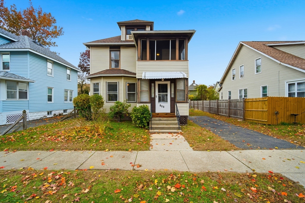122 Hastings Street Springfield, MA 01104 - Photo 2 of 29 a front view of a house with a yard