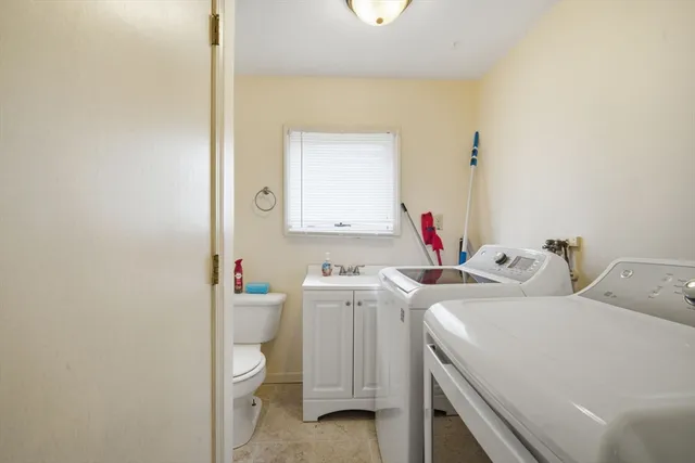 a view of washer and dryer in a utility room