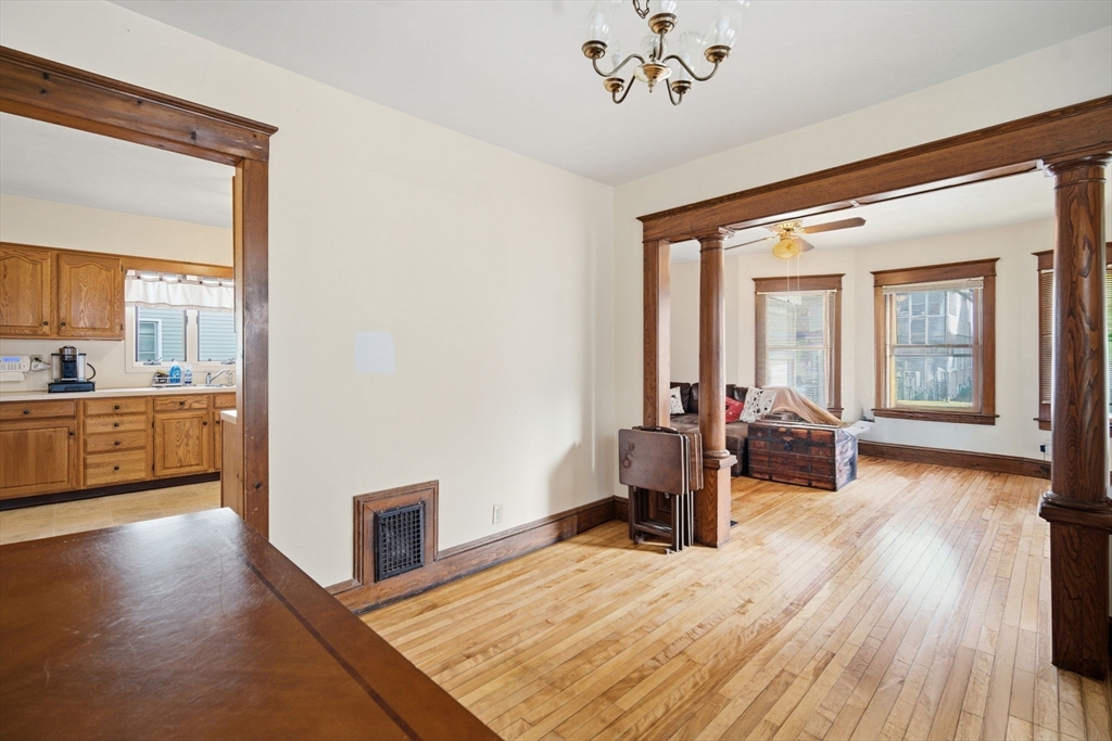 122 Hastings Street Springfield, MA 01104 - Photo 8 of 29 a view of a living room and a wooden floor