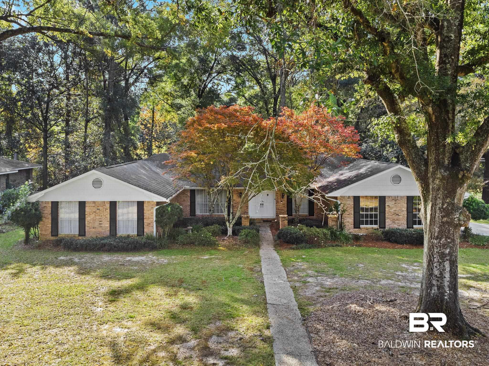 752 Evergreen Street Fairhope, AL 36532 - Photo 99 of 100 Ranch-style home featuring a front lawn, brick siding, and roof with shingles