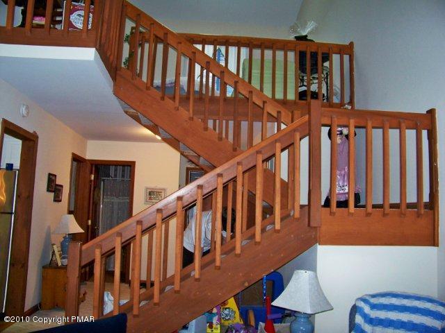 F2 Monomonock Road Cresco, PA 18326 - Photo 12 of 13 a view of staircase with lots of wooden floor and a dining table