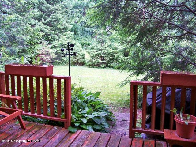 F2 Monomonock Road Cresco, PA 18326 - Photo 13 of 13 a view of a wooden deck and a backyard