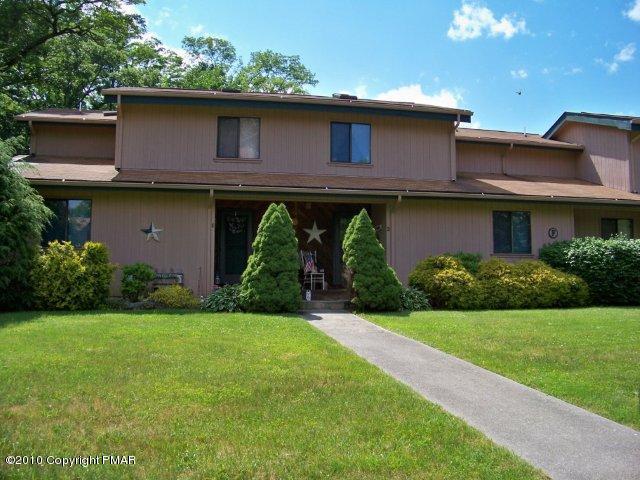 F2 Monomonock Road Cresco, PA 18326 - Photo 2 of 13 a front view of a house with garden